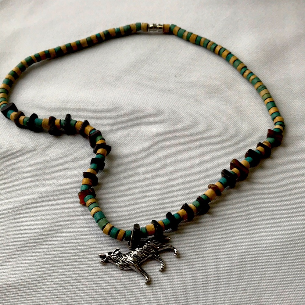 Wooden necklace wolf charm .